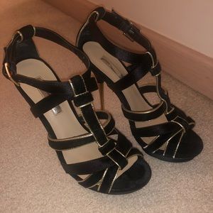 Black and gold stilettos